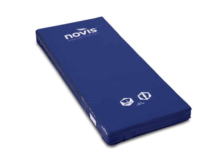 Blue mattress with 'Novis' branding on a white background